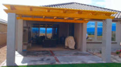 Outdoor kitchen and shelter by Rising Sun Landscaping & Maintenance