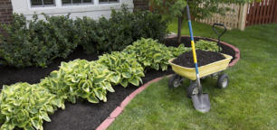 One property home staging technique is to use fresh mulch in garden beds.