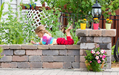 block wall, enjoyable landscaping