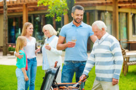 Family cookouts in a landscaped yard are great ways to enjoy your landscaping.